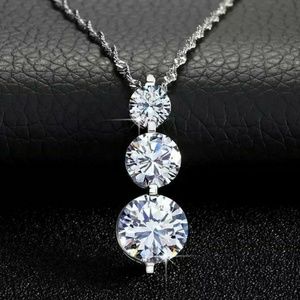 14K WHITE GOLD THREE DIAMOND NECKLACE